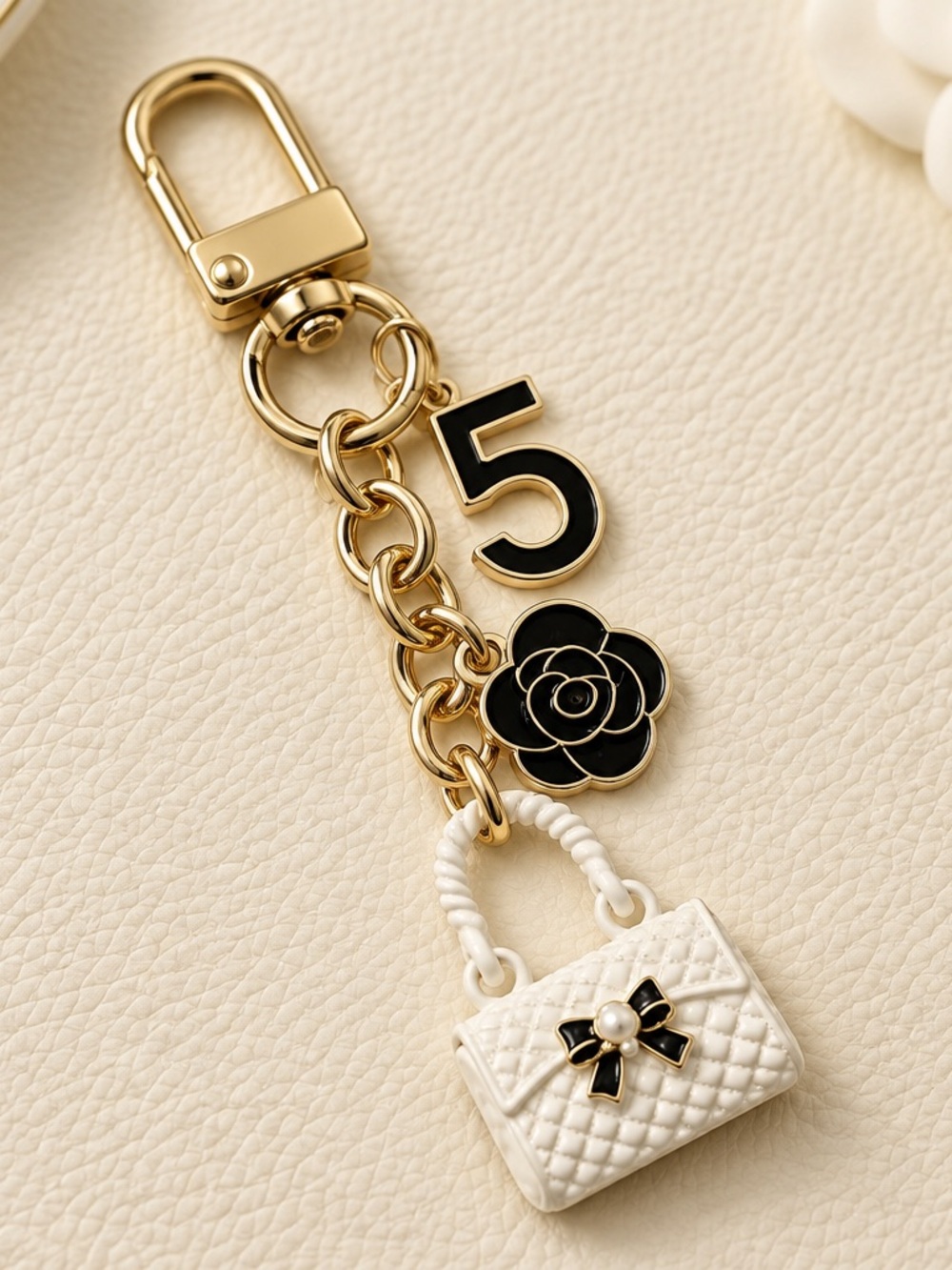 Mint Gold-Tone Keychain with Black & White Charms